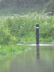 SX22749 Flooded footpath by Afon Col-huw river.jpg